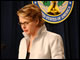 Secretary Spellings speaks as President Bush listens during her swearing in ceremony at the U.S. Department of Education.