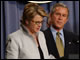 Secretary Spellings speaks as her daughters and President Bush listen during her swearing in ceremony.