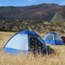 Bright blue tents brighten up the wilderness camping area at Holua Campground.