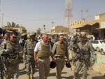 Congressman Lynch and Congressman Platts are escorted by the Army’s 2nd Battalion, 237th Infantry Regiment in Samarra. 