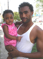 Photo of Frederick Jarmon with his daughter Ani.