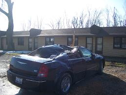 Large Tree blown down by Tornado Crushed Car in Elwin on Mar 1, photo by Chris Miller