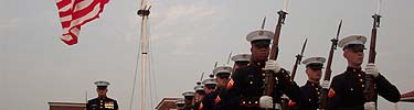 The U.S. Marines perform during an evening tattoo ceremony.