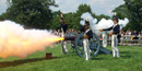 Fort McHenry Guard fires a cannon.