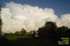 Cumulonimbus clouds near 
			Decatur, 5/23/2004.  Photo by Bill Nowlin.