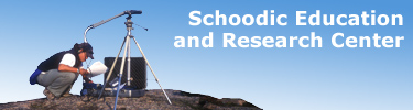 Schoodic Education and Research Center banner with researcher photo