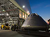 The simulated Orion crew module heads to its temporary home in a hangar at NASA's Langley Research Center