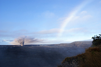 Ash-laden Halema`uma`u plume captures the rainbow in the early morning light. Photo taken from Steaming Bluffs.