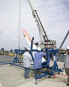 Technicians prepare HYBOLT experiment