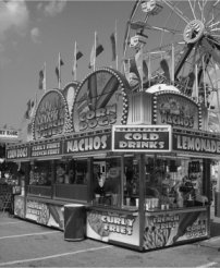 Photograph of a food stand in an amusement park.