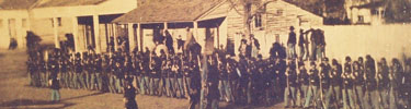 soldiers from 13 Kansas in formation on Garrison Ave.