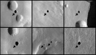 Seven very dark holes on the north slope of a Martian volcano that have been proposed as possible cave skylights