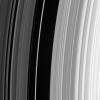 The sharp outer boundary of Saturn's B ring, which is the bright ring region seen to the right in this image, is maintained by a strong resonance with the moon Mimas. For every two orbits made by particles at this distance from Saturn