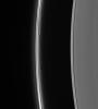 Prometheus dips into the inner F ring at its farthest point from Saturn in its orbit, creating a dark gore and a corresponding bright streamer