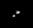 In their orbital ballet, Janus and Epimetheus swap positions every four years -- 
one moon moving closer to Saturn, the other moving farther away. The two 
recently changed positions