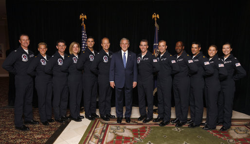 President George W. Bush poses for a photo Wednesday, May 28, 2008 with members of the 2008 Thunderbirds, the United States Air Force Air Demonstration Squadron, prior to President Bush's commencement address at the U.S. Air Force Academy in Colorado Springs. From left to right, Thunderbirds commander/leader Lt. Col. Greg Thomas, Maj. Charla Quayle, Lt. Col. Rob Skelton, Maj. Samantha Weeks, Maj. Kirby Ensser, Capt. Gifford Ploetz, Maj. Chris Austin, Maj. Scott Poteet, Maj. T. Dyon Douglas, Maj. Tony Mulhare, Capt. Amy Glisson and Capt. Elizabeth Kreft. White House photo by Eric Draper