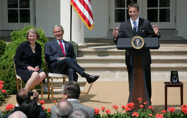 President George W. Bush and Secretary Margaret Spellings of the Department of Education, laugh as they listen to remarks by Mike Geisen, the 2008 National Teacher of the Year. Said the 35-year-old, 7th-grade science teacher from Prineville, Ore., "Each of the teachers that sits here today amongst us is here today because of their commitment and their courage to live in light of this fact: Children are fully human beings. Children are fully human beings. They're not conglomerations of hormones, they're not animals to be trained, they're not just numbers to be measured or future commodities to produce. They are our equals. They're the here and the now. And they are beautiful." White House photo by Shealah Craighead