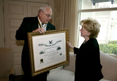 Mrs. Lynne Cheney is presented the National Society Sons of the American Revolution (NSSAR) Distinguished Patriot Award by Timothy R. Bennett, NSSAR Registrar General, Wednesday, July 30, 2008, at the Vice President's Residence at the Naval Observatory in Washington, D.C. White House photo by David Bohrer