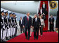 President George W. Bush and Mrs. Laura Bush are welcomed on their arrival Tuesday, Aug. 5, 2008 to Seoul Airbase, outside Seoul, South Korea, by Korean Minister of Foreign Affairs and Trade Myung-hwan Yu. White House photo by Eric Draper