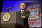 President George W. Bush, delivering his remarks Wednesday, Aug. 22, 2007, to the Veterans of Foreign Wars National Convention in Kansas City, Mo., said "So long as we remain true to our ideals, we will defeat the extremists in Iraq and Afghanistan." White House photo by Chris Greenberg