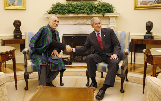President George W. Bush meets with President Hamid Karzai of Afghanistan in the Oval Office Friday, Sept. 26, 2008, at the White House. White House photo by Eric Draper