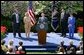 President George W. Bush discusses the economy in the Rose Garden Tuesday, April 15, 2003. Accompanying President Bush on stage are, from left, small business owners Tim Barrett, Christine Bierman, Frank Fillmore and Karla Aaron.  White House photo by Paul Morse