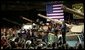 President George W. Bush addresses employees of the Lima Army Tank Plant, where the Abrams M1A2 tank is built, in Lima, Ohio, April 24, 2003. "I'm here to thank you all for your service to our country, and thank you for the vital contribution you have made to peace and freedom," said the President in his remarks. "And each of you have had a part in this mission. Each of you are a part to making sure this country is strong enough to keep the peace."  White House photo by Paul Morse