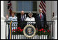 President George W. Bush and Mrs. Laura Bush wave to an audience of 7,000 guests during the Arrival Ceremony for Her Majesty Queen Elizabeth II and His Royal Highness The Prince Philip Duke of Edinburgh Monday, May 7, 2007, on the South Lawn.  White House photo by David Bohrer