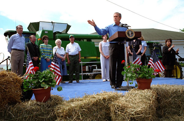 President Bush returned to Tom and Judy Barrett's farm in Dallas City, Iowa, to celebrate the tax cut Friday, June 8.