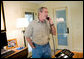  President George W. Bush calls troops from his ranch in Crawford, Texas, Thanksgiving Day, Thursday, Nov. 24, 2005. White House photo by Eric Draper