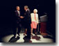 President George W. Bush shakes hands with his father, former president George Bush, as former first lady Barbara Bush looks on from the podium during a Celebration of Reading event Thursday, April 26, in Houston. WHITE HOUSE PHOTO BY PAUL MORSE