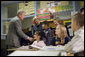 President George W. Bush and Education Secretary Margaret Spellings visit with students at North Glen Elementary School in Glen Burnie, Md., Monday, Jan. 9, 2006. "This is a fine school," said the President in his remarks about 'No Child Left Behind' at the school. "We're here to herald excellence. We're here to praise the law that is working. I'm here to thank the teachers, not only here, but around the state of Maryland and around the country, who are dedicating their lives to providing hope for our future." White House photo by Kimberlee Hewitt