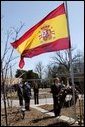 Honoring the victims of terrorist bombings in Spain, President George W. Bush bows his head in silence during a wreath-laying ceremony at the Spanish ambassadors' residence in Washington, D.C., Friday, March 12, 2004.   White House photo by Paul Morse