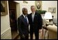 President George W. Bush welcomes United Nations Secretary General Kofi Annan to the Oval Office Tuesday, Feb. 3, 2004. After their meeting, they addressed the press.   White House photo by Paul Morse