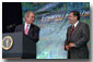 President Bush praised Secretary of Energy Spencer Abraham during a speech about energy efficiency Thursday, June 28 at the Department of Energy. WHITE HOUSE PHOTO BY ERIC DRAPER