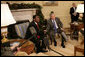 President George W. Bush welcomes President Boni Yayi of Benin to the White House Thursday, Dec. 14, 2006. Among other issues, the two leaders talked about joint efforts to combat HIV/AIDS and malaria in Benin. White House photo by Eric Draper