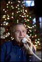 President George W. Bush makes Christmas Eve telephone calls to members of the Armed Forces at Camp David, Sunday, Dec. 24, 2006.  White House photo by Eric Draper