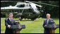 President George W. Bush and British Prime Minister Gordon Brown laugh during their joint press availability Monday, July 30, 2007, at Camp David near Thurmont, Md. White House photo by Eric Draper