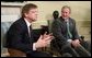 President George W. Bush breaks out in laughter as he listens to Belgian Prime Minister Guy Verhofstadt Tuesday, January 17, 2006, during the Prime Minister's visit to the Oval Office.  White House photo by Paul Morse