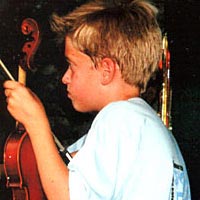 Music camp participant waits to perform with Springfield Symphony Orchestra, June 1999