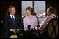 President George W. Bush and Mrs. Bush participate in an interview with Larry King, right, in Los Angeles, Calif., Thursday, Aug. 12, 2004.  White House photo by Eric Draper