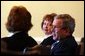  President George W. Bush meets privately with individuals who have signed up for medical savings accounts and small business owners to discus the savings accounts and association health plans in the Dwight D. Eisenhower Executive Office Building Wednesday, Jan. 28, 2004.   White House photo by Tina Hager