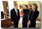 President George W. Bush talks with Dayna Curry, center, and Heather Mercer in the Oval Office Nov. 26. The two humanitarian workers recently returned to the United States after being held captive by the Taliban regime for three months. "Heather Mercer and Dayna Curry decided to go to help people who needed help," said the President in his remarks to the media. "Their faith led them to Afghanistan. One woman who knows them best put it this way: they had a calling to serve the poorest of the poor, and Afghanistan is where that calling took them.". White House photo by Eric Draper.