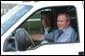 President George W. Bush and Japanese Prime Minister Junichiro Koizumi begin a tour of the President's ranch near Crawford, Texas, after the Prime Minister's arrival Thursday afternoon, May 22, 2003.  White House photo by Tina Hager