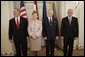 President George W. Bush stands with Latvia's President Vaira Vike-Freiberga, Estonia President Arnold Ruutel and Lithuania President Valdas Adamkus for a photo Saturday, May 7, 2005, in Riga, Latvia.  White House photo by Eric Draper