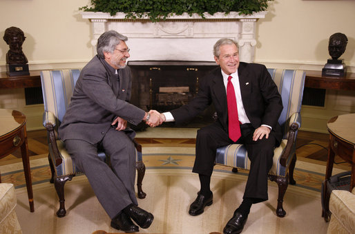President George W. Bush and Paraguay's President Fernando Lugo shake hands Monday, Oct. 27, 2008, during their meeting with reporters in the Oval Office. White House photo by Eric Draper