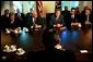 President George W. Bush discusses the progress of Medicare modernization legislation with members of Congress in the Cabinet Room Thursday, Sept. 25, 2003. Pictured sitting next to the President are, from left: Rep. Bill Thomas, R-Calif.; Speaker Dennis Hastert, R-Ill.; Sen. Bill Frist, R-Tenn.; and Sen. Charles Grassley, R-Iowa.  White House photo by Tina Hager