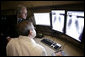 President George W. Bush visits with radiologist Dr. Jeffrey Kunin during a briefing on new x-ray technology at the Saint Luke’s-Lee’s Summit hospital in Lee’s Summit, Mo., Thursday, Jan 25, 2007. President Bush also participated in a roundtable discussion on health care initiatives at the hospital. White House photo by Eric Draper