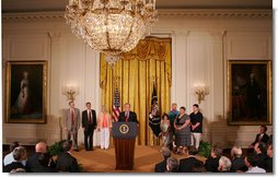 President George W. Bush, joined by families who were aided by the use of adult stem cells in their health treatments, addresses his remarks concerning his veto of S.5, the “Stem Cell Research Enhancement Act of 2007,” in the East Room of the White House Wednesday, June 20, 2007.  White House photo by Joyce N. Boghosian