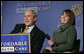 President George W. Bush and panelist Amy Childers react to an audience members question during a forum discussion on health care initiatives Wednesday, Feb. 21, 2007, at the Chattanooga Convention Center in Chattanooga, Tenn. White House photo by Paul Morse